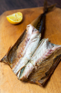 Smoked mackerel on kitchen background - studio shot