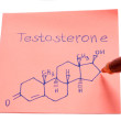 Testosterone chemical structure formula written on remember note